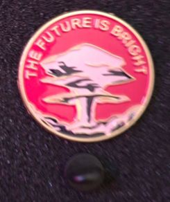 The future is bright, pin back badge.