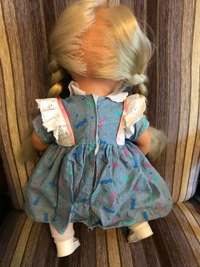 Pre-loved dressed soft body doll