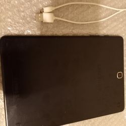 Samsung Galaxy Tab A with charging cable