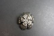 Flower-shaped Brooch with black and white crystals