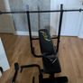 weight bench with weights and bars Image 2