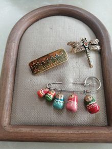 Brooches ceramic, wood and costume