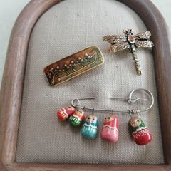 Brooches ceramic, wood and costume