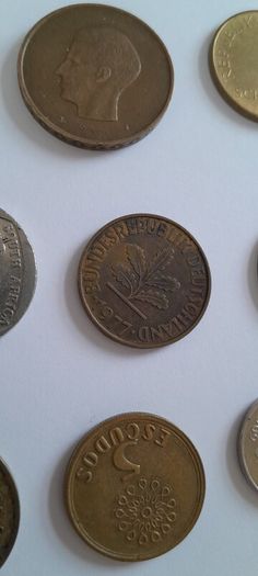 Coins a mix of different countries 28 coins in total registered post included
