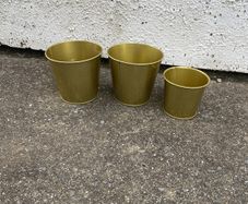 3x golden flower pots inside & outside