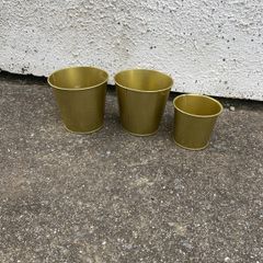 3x golden flower pots inside & outside