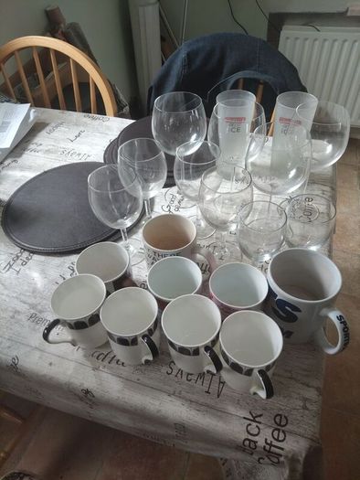 assorted drinking glasses, cups mugs.