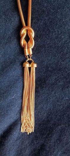 Long gold 1920s style necklace