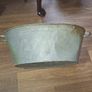 A Beautiful Large Old Galvanized Steel Wash Tub with Side Handles in nice used condition and is frequently used for Farmhouse Decor or Garden Image 4