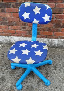 Child's Swivel Chair (used).
