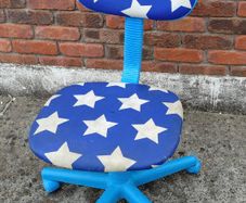 Child's Swivel Chair (used).