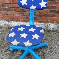 Child's Swivel Chair (used).