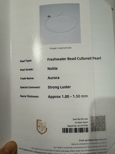 Freshwater pearl necklace with GUILD certificate