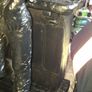 Large Cowboy Sculpture is titled Cutting the Dust and was created by artist Michael Garman. It is a Western Themed piece featuring a Cowboy Leaning Against a Counter, Image 9