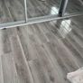 New 12mm high gloss grey laminated floor Image 6
