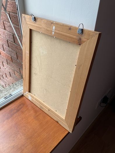 Mirror in wooden frame
