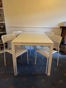 IKEA white dining table and chairs