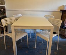 IKEA white dining table and chairs