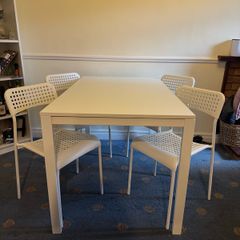 IKEA white dining table and chairs