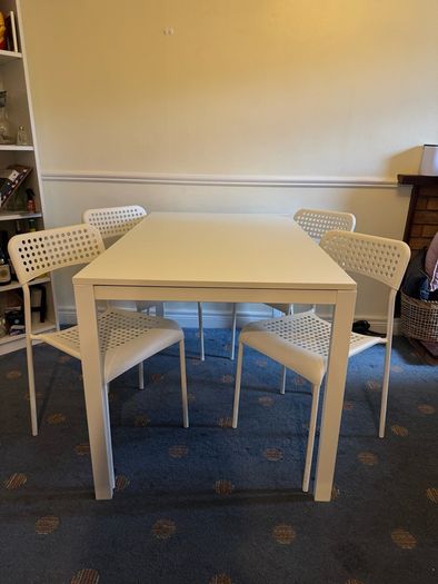 IKEA white dining table and chairs