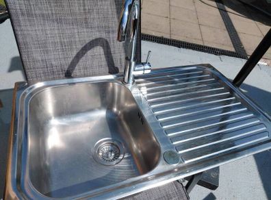 Kitchen sink and tap