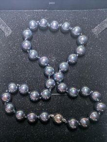 Beaded necklace lock magnet