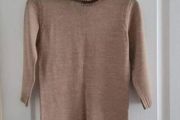 carmel and black turtleneck