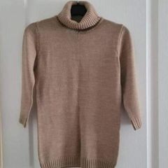 carmel and black turtleneck