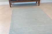 wool rug soft green colour