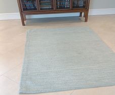 wool rug soft green colour