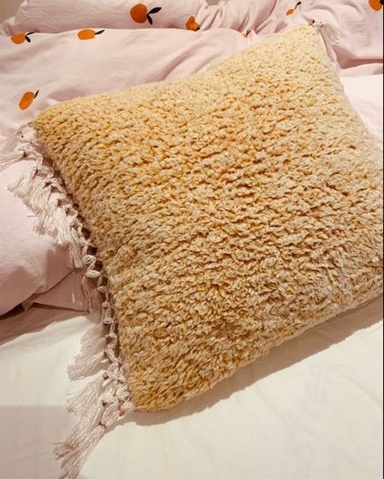 Amber Thrown Pillow
