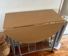 small kitchen table on wheels and with storage
