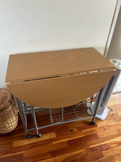 small kitchen table on wheels and with storage