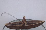 Antique fisherman and boat
