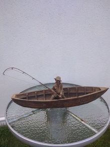 Antique fisherman and boat
