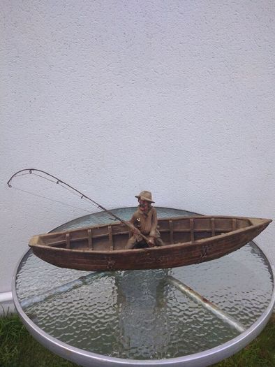 Antique fisherman and boat