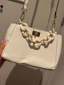 white leather hand bag