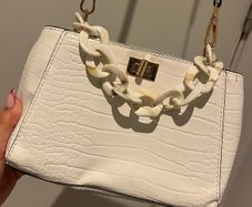 white leather hand bag