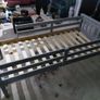 Grey single bed with sides and new mattress Image 3