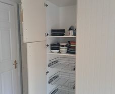 kitchen cabinet with baskets