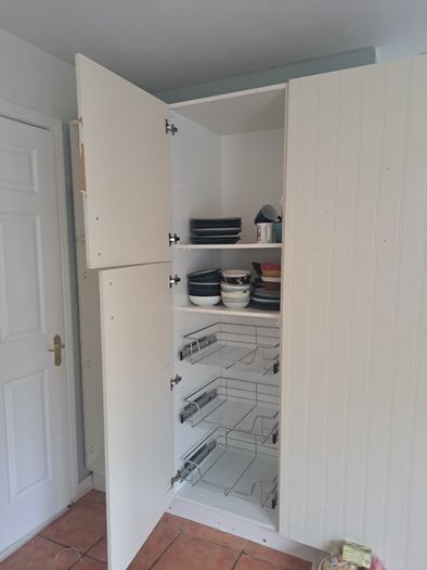kitchen cabinet with baskets