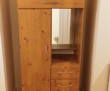 Pine finish Combination wardrobe with hanging  space, closed & open shelving, mirror, 3 lower drawers