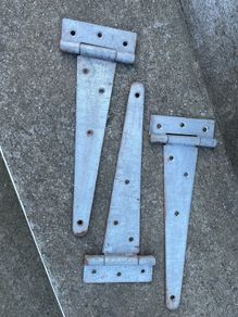 A  Trio of Galvanized T hinges (Dimensions in images).