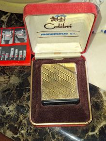 Colibri Monomatic G.T. lighter, a butane-powered model produced in the 1950s Postage Available or Collection