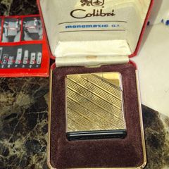 Colibri Monomatic G.T. lighter, a butane-powered model produced in the 1950s Postage Available or Collection