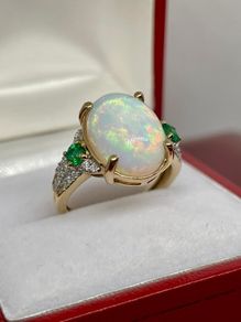 Gold Rind with Opal, Emerald and Moissanite