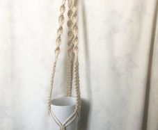 Macrame plant hanger with plant pot