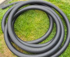 Perforated drainage pipe