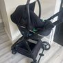 Origin travel system with Enfasafe i size R129 car seat with Isofix base and rain cover Image 6