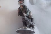 a lovely figurine of the man of the road